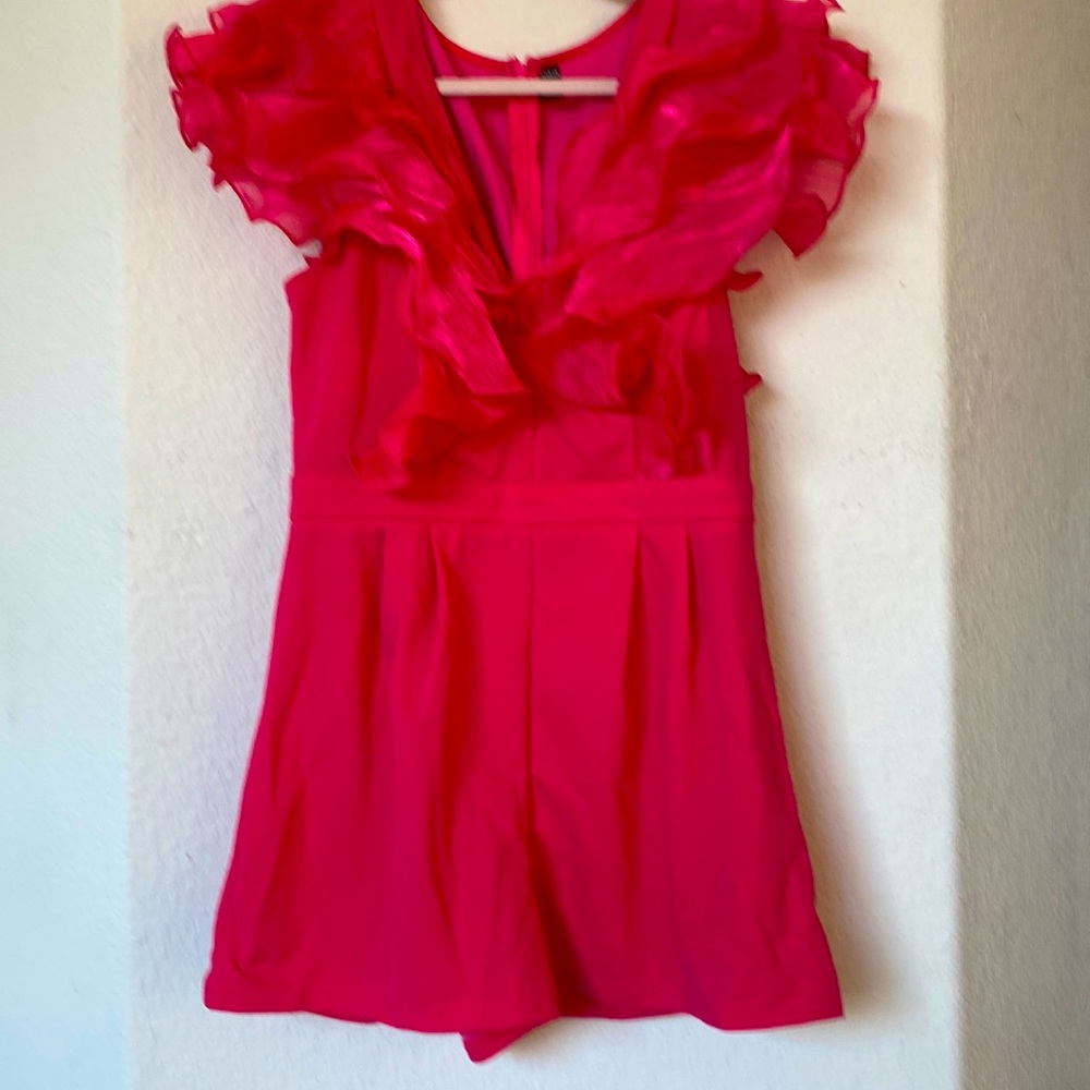 Hot pink SHEIN romper never worn before runs really small i’d size up.